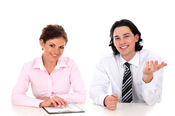 istock Business people sitting at desk 146074694