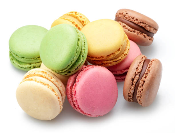istock Colorful french macarons isolated on white background. 1460747283