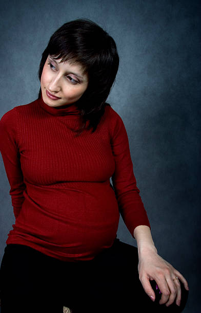 istock Charming expecting mother on a chair 146074751