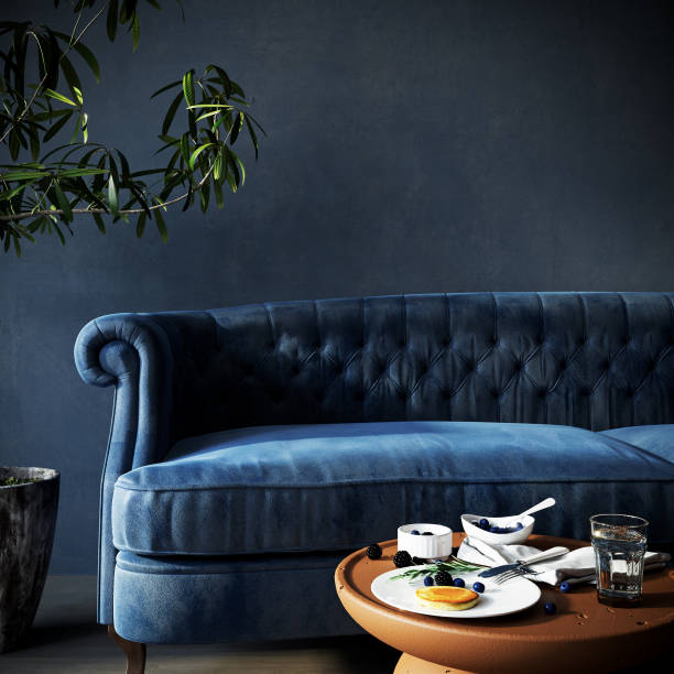 istock Interior with blue sofa and empty dark blue wall background. Living room 1460757563