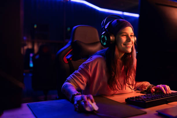 istock Happy gamer playing eSports over desktop PC. 1460760774