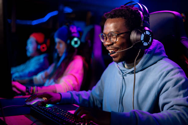 istock Happy African American gamer enjoying while playing eSports over PC. 1460761330