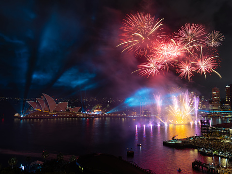 Sydney, Australia - January 26, 2023: Red colored fireworks at Sydney Harbour for Australia Day.
