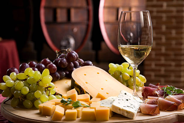 botti di vino nella vecchia cantina - wine cheese food cellar foto e immagini stock