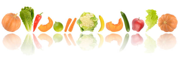 istock Fresh cut fruits and vegetables with light reflection isolated on white 1460770017