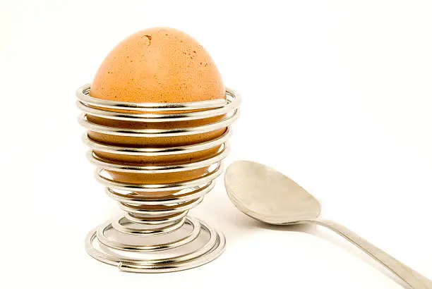 Still-life with egg, over white background