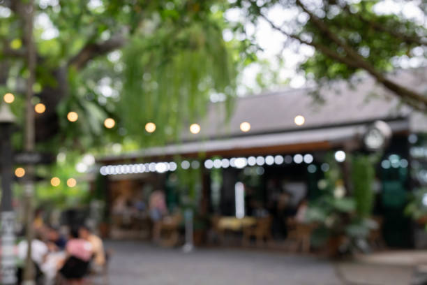 istock Blur coffee shop or cafe restaurant with abstract bokeh light image background. 1460775414