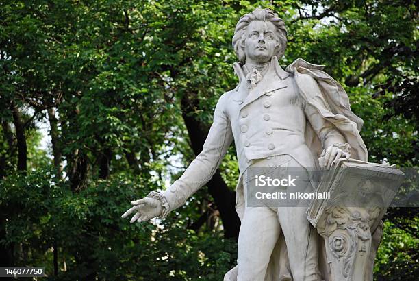 Statue Of Mozart In Front Of Trees Stock Photo - Download Image Now - Wolfgang Amadeus Mozart, Photography, Austria