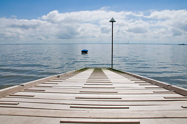 istock Boat slipway and a calm sea. 146077918