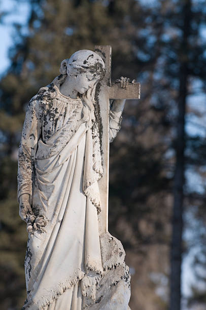 istock Cemetery Statue of the virgin mary 146077989