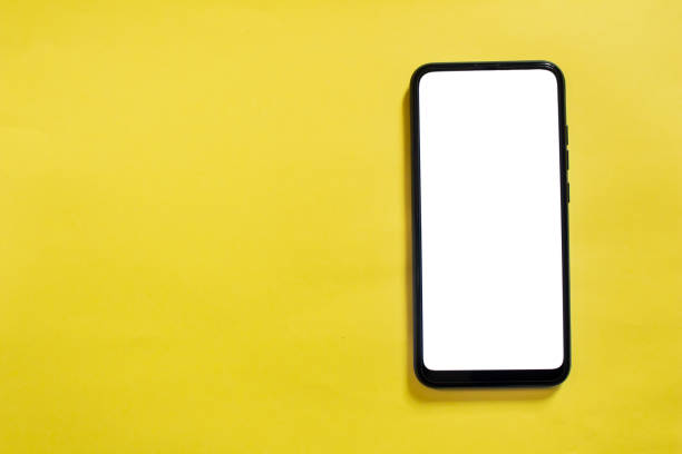istock Smartphone on yellow background with blank white screen 1460783725