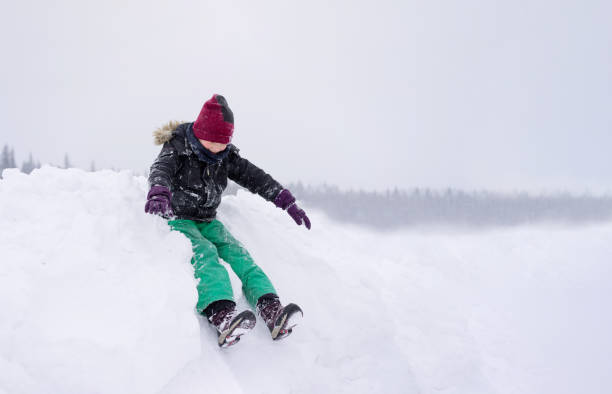 Kids having fun in a snow. Winter activities
