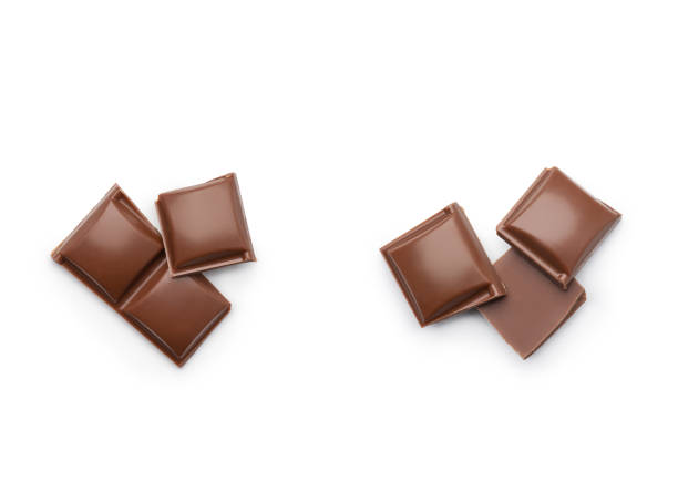 istock Pieces of milk chocolate on a white background 1460784095