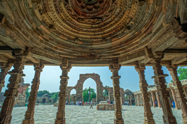 Iron pillar at Qutub minar,A unesco world heritage site stock photo