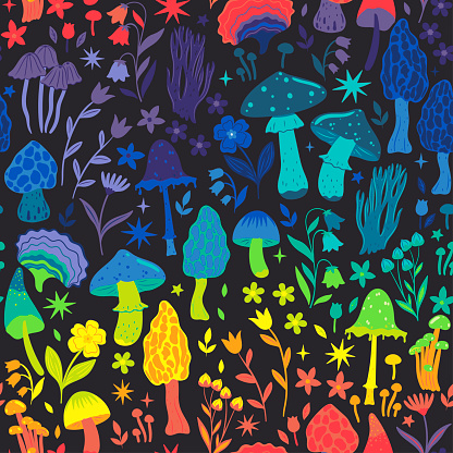 Seamless pattern with magical mushrooms and flowers. Vector image.