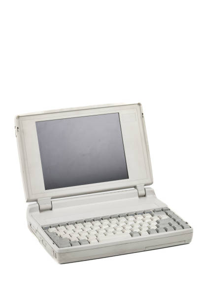 istock Old laptop studio shot isolated on white 1460787733