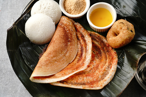 South Indian vegetarian breakfast idli karam podi dosa sambar chutney powder ghee and filter coffee