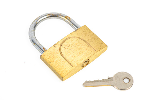 Metal padlock for door and hinge. Close-up. Isolated object on a white background. Isolate.