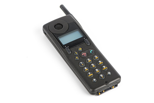 A modern, cordless home phone, isolated on a white background.