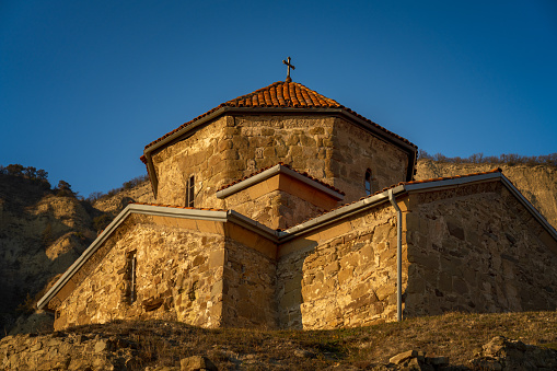 Shio Mgvime Monastery at sunset. Mtskheta, Georgiacross