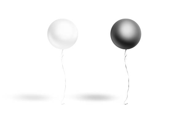 istock Blank black and white sphere balloon flying mockup, front view 1460789977