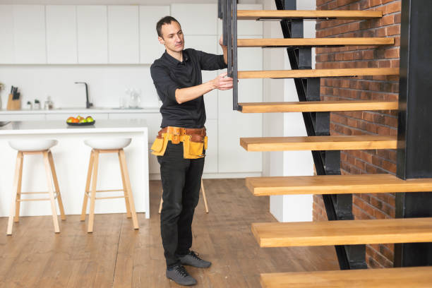 istock Home improvement handyman building staircase in a natural light 1460792076