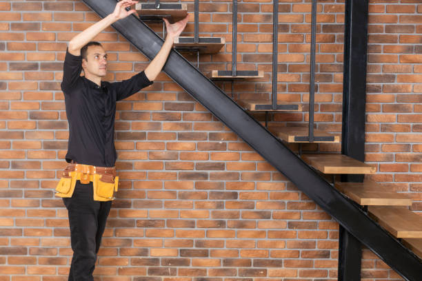 istock the worker is repairing the stairs 1460792353