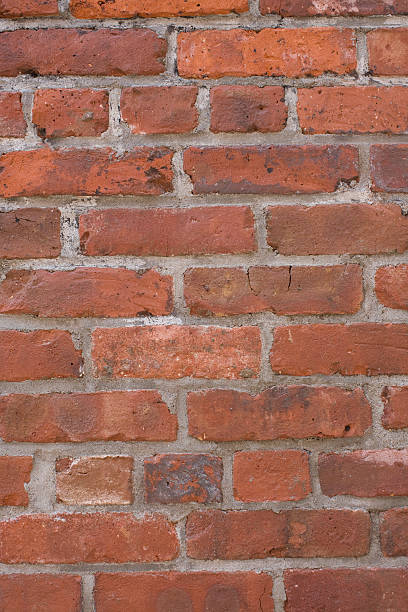 Rough mur de briques sur un vieux bâtiment - Photo