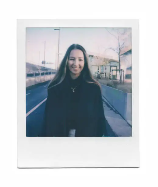 Photo of Instant photo portrait of a young businesswoman