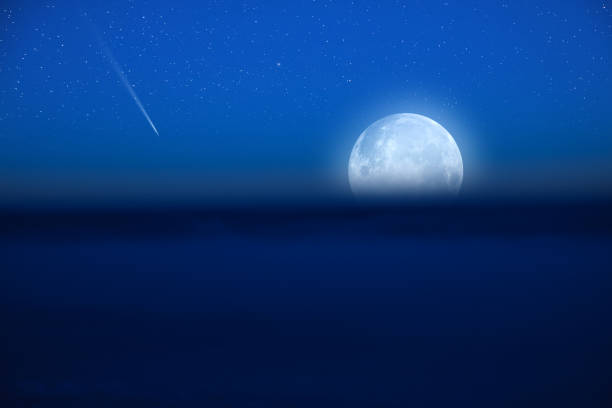 istock Starry Milky Way skies with Moon, comet and meteor shower, falling and shooting stars. 1460802741