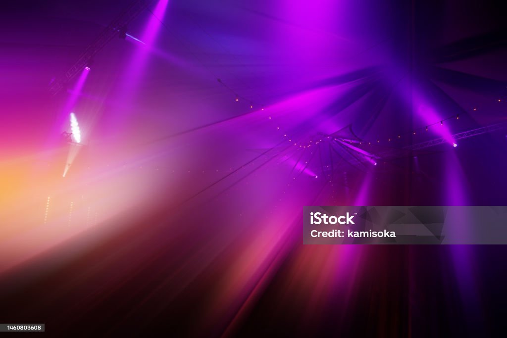 Concert lights in purple Backgrounds Stock Photo