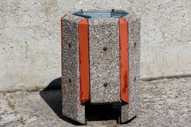 istock A concrete and wooden litter bin on the pavement 1460812151