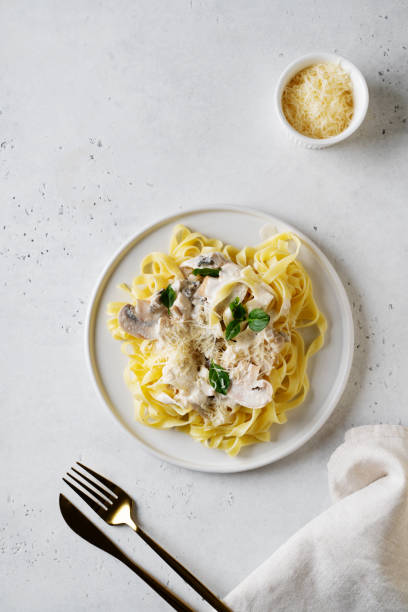 istock Pasta mushrooms with chicken, parmesa and basil 1460816749