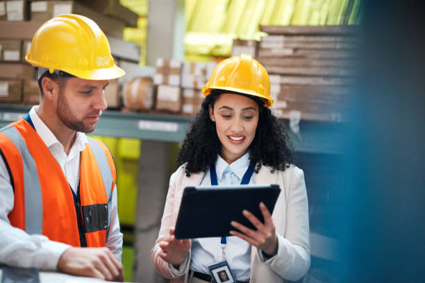 istock Factory, tablet and people teamwork for storage, inventory and supply chain management for b2b distribution. Warehouse, Industry partner or worker on digital technology, software and logistics boxes 1460822494
