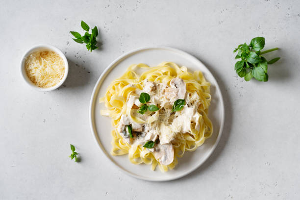 istock Pasta mushrooms with chicken, parmesa and basil 1460823260