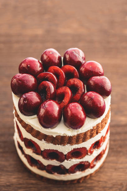 Cherry Cake On Wooden Board