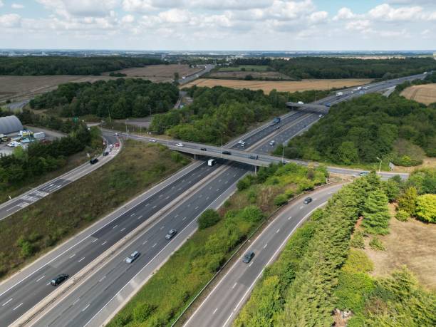 Hastingwood interchange junction on M11 Harlow Essex UK drone aerial view Hastingwood interchange junction on M11 Harlow Essex UK drone aerial view harlow essex stock pictures, royalty-free photos & images