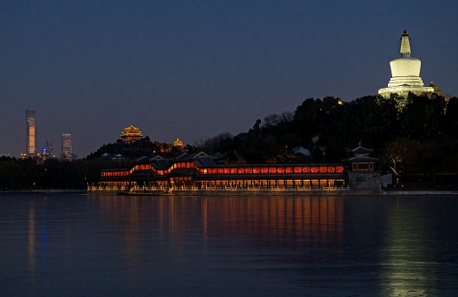 From Beihai park can see most of modern time Beijing landmarks including central business district skyscrapers, Jingshan pavilions and white pagoda.