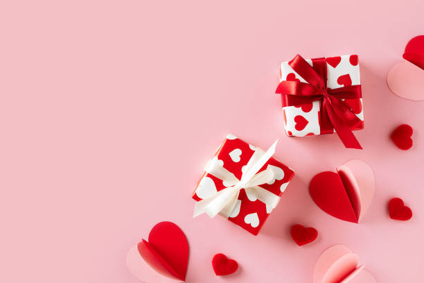 istock Valentines card wiht heart gift on pink background 1460829149