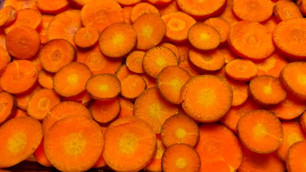 istock sliced ​​carrots for cooking. rows of thin orange circles 1460831435