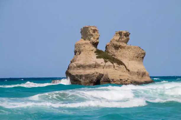 Photo of Cliffs and outcrops at Torre dell'Orso beach, Lecce, Italy.