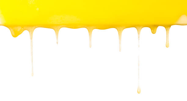 istock Dripping yellow honey on a white background. 1460832054