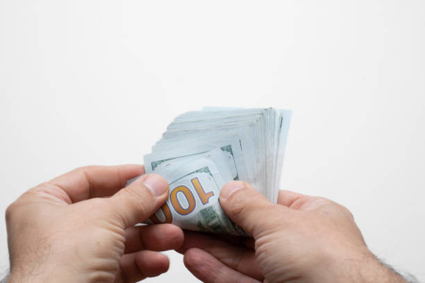 istock Money in the hands 1460834729
