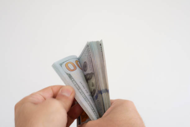 istock Money in the hands 1460834982