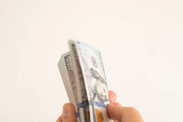 istock Money in the hands 1460835245