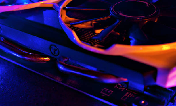 istock Graphics card in neon light. Cooling in a computer. Fan blade 1460837520