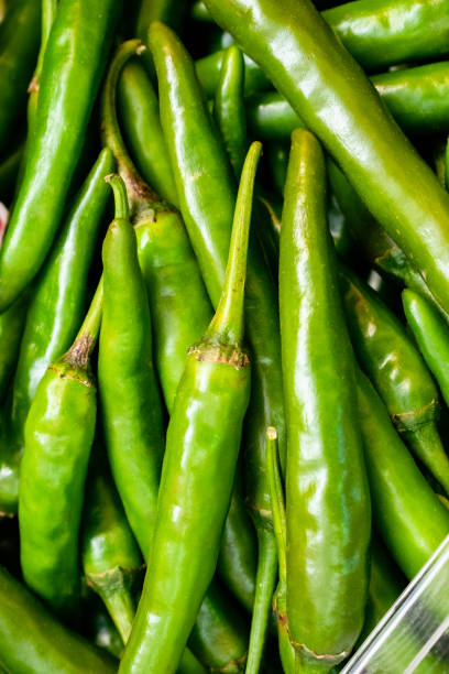 istock Fresh green chili pepper background. 1460838610