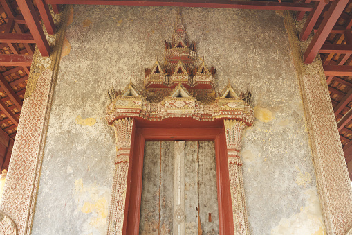 Ornated door at Laotian temple Wat Sisaket in Vientiane