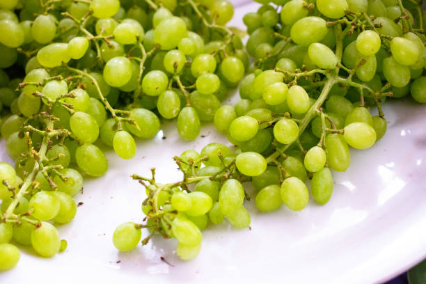 istock Fresh grapes on a plate,closeup shot. 1460840658