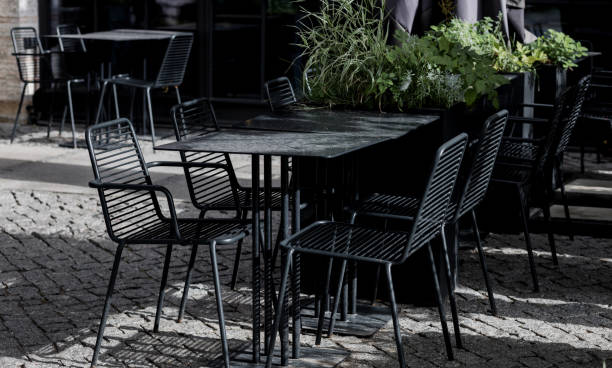 istock Cozy street with tables of cafe 1460841032